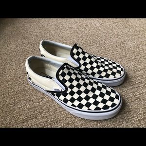 Checkered slip-on vans